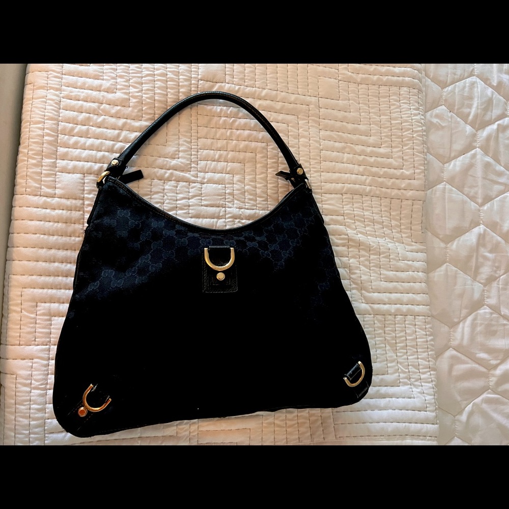 Gucci black monogram bag.